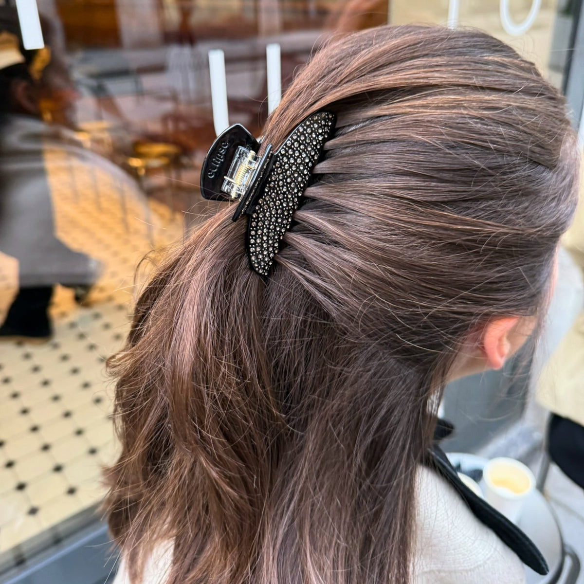 The Date Night claw clip worn in an evening updo